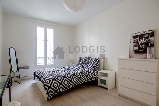 Bedroom with wooden floor