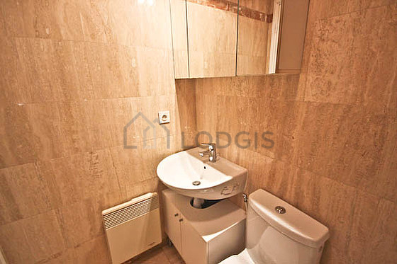 Pleasant and bright bathroom with tile floor
