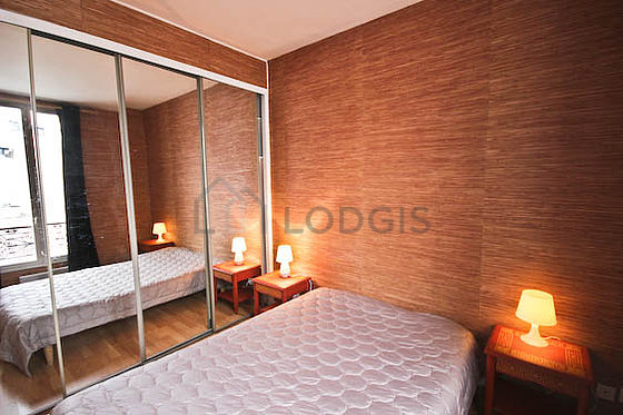 Bedroom with wooden floor