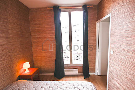 Bedroom with windows facing the courtyard