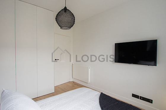 Bedroom with wooden floor