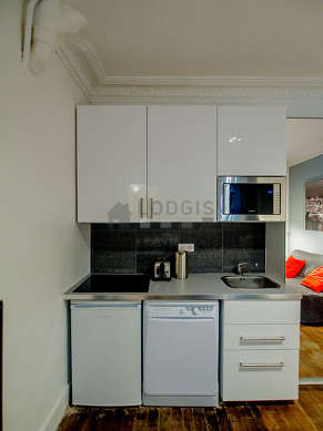 Kitchen equipped with dishwasher, hob, refrigerator, freezer