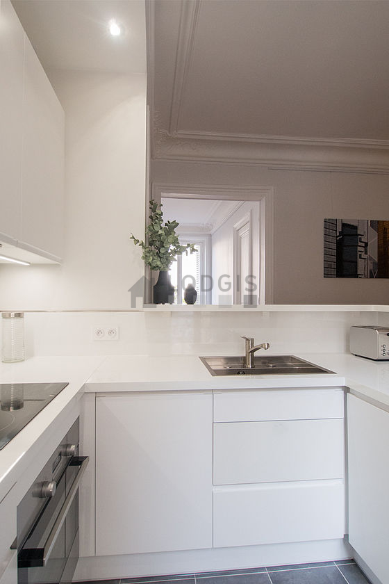 Bright kitchen facing the courtyard