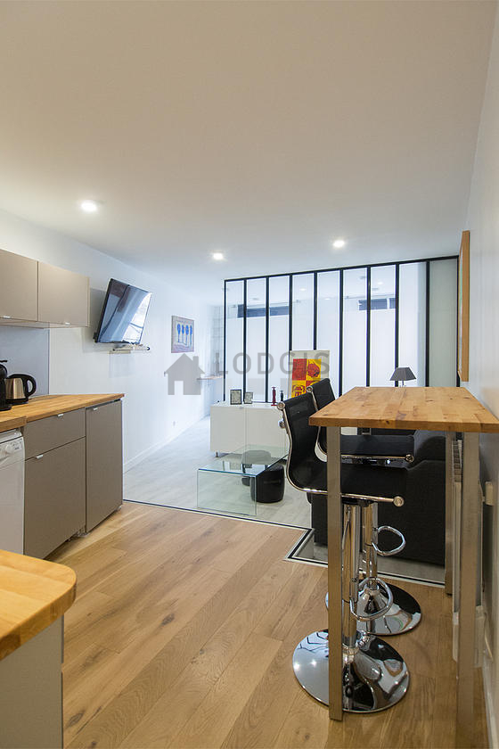Kitchen where you can have dinner for 2 person(s) equipped with washing machine, refrigerator, freezer, crockery