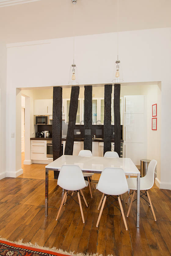 Kitchen equipped with washing machine, refrigerator, extractor hood, crockery