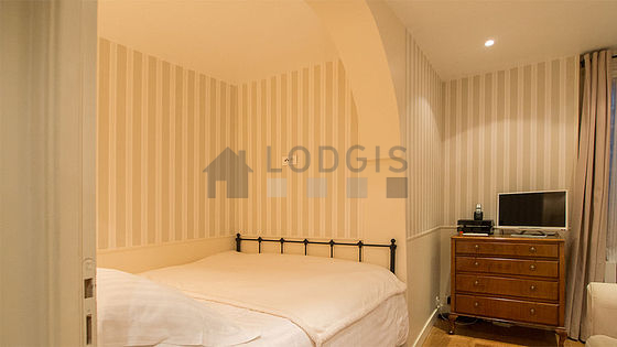 Bedroom with wooden floor