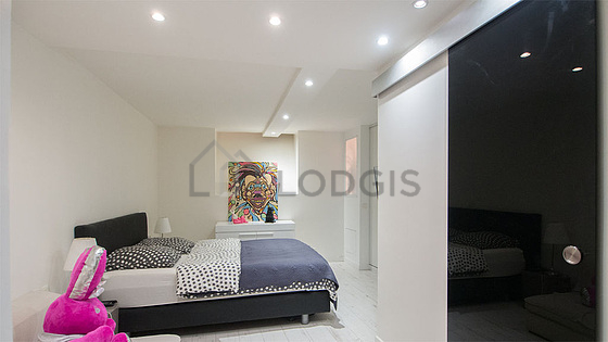 Chambre de 12m² avec du parquet au sol
