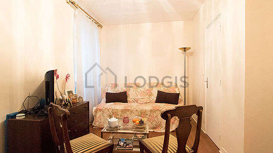 Very quiet living room furnished with 1 sofabed(s) of 120cm, tv, storage space, 3 chair(s)