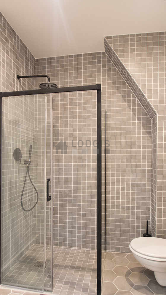 Pleasant and bright bathroom with tile floor