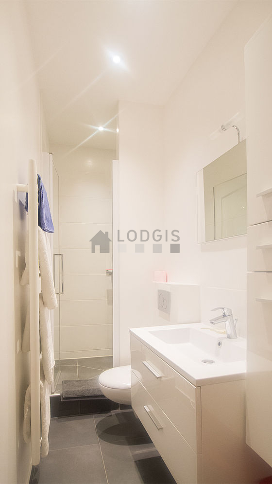Pleasant and bright bathroom with tile floor