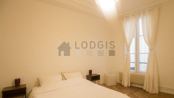 Bedroom with wooden floor