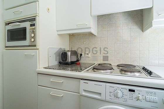 Kitchen where you can have dinner for 2 person(s) equipped with washing machine, refrigerator, freezer, extractor hood