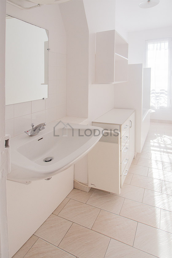 Bathroom equipped with cupboard