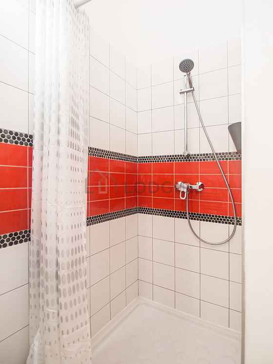Bathroom equipped with washing machine, bath towels