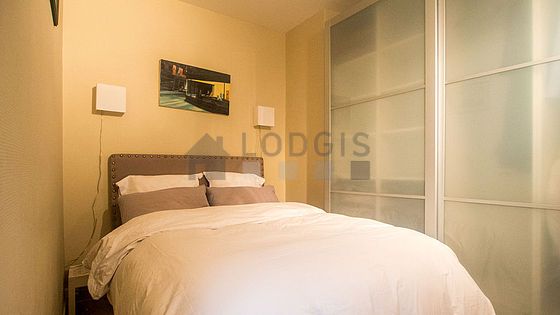Bedroom with wooden floor