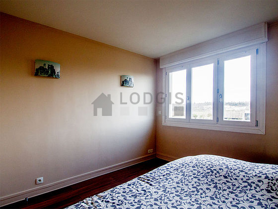 Very bright bedroom equipped with wardrobe, cupboard, bedside table