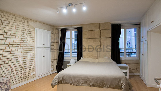 Bedroom with wooden floor