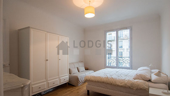 Bedroom with wooden floor