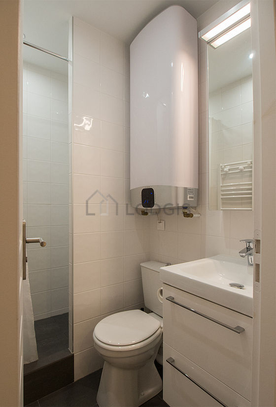 Pleasant and bright bathroom with tile floor