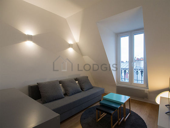 Very quiet living room furnished with 1 sofabed(s) of 140cm, tv