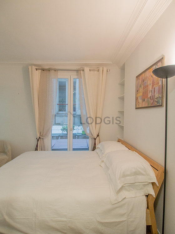 Bedroom with double-glazed windows and balcony