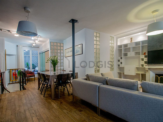 Very quiet living room furnished with tv, cupboard, 6 chair(s)