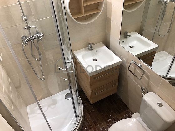 Bathroom equipped with cupboard