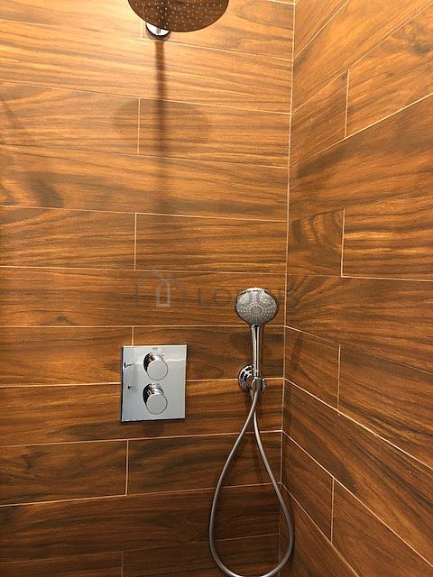 Pleasant and bright bathroom with tile floor
