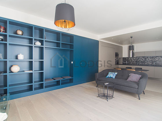 Very quiet living room furnished with tv, cupboard