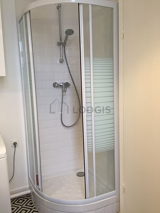 Pleasant and bright bathroom with tile floor