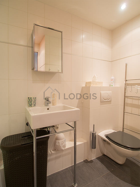 Bathroom equipped with shelves