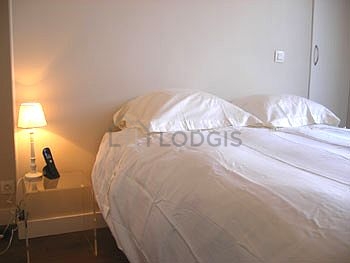 Chambre de 11m² avec du parquet au sol