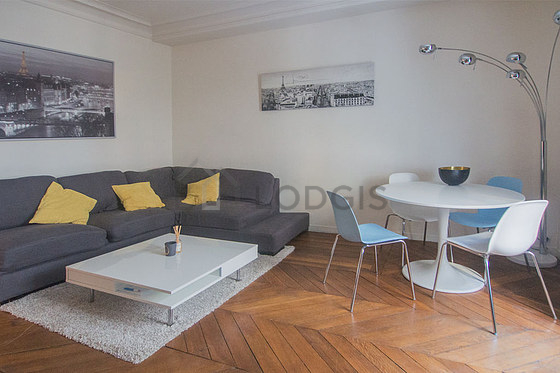 Living room with double-glazed windows facing the road