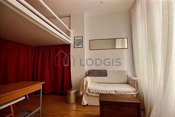 Very quiet living room furnished with 1 loft bed(s) of 160cm, sofa, coffee table, wardrobe