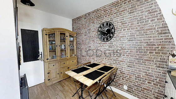 Kitchen equipped with washing machine, refrigerator, freezer, crockery