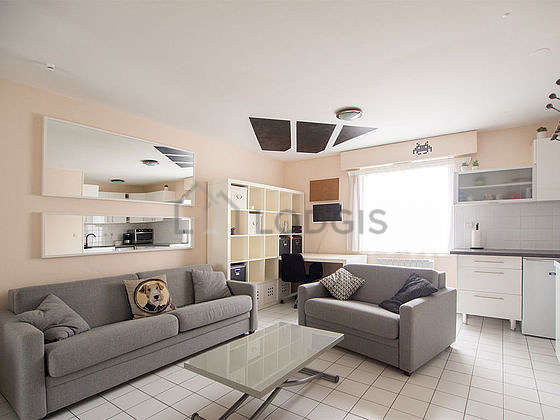 Very quiet living room furnished with 1 sofabed(s) of 140cm, sofa, coffee table, wardrobe