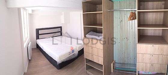 Bedroom of 11m² with woodenfloor