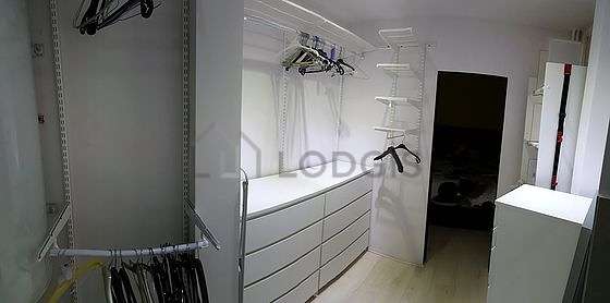 Beautiful dressing-room serviced with : wardrobe, shelves