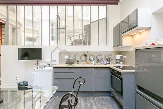 Kitchen where you can have dinner for 4 person(s) equipped with washing machine, dryer, refrigerator