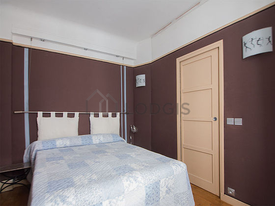 Bedroom with wooden floor