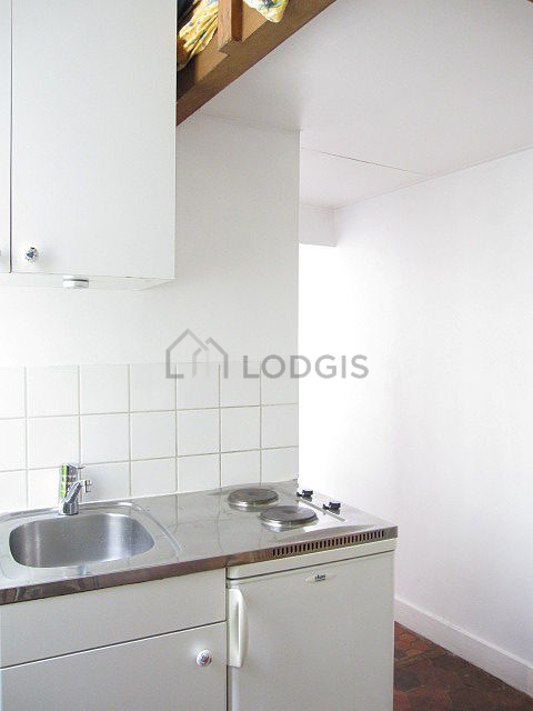 Bright kitchen with windows facing the courtyard