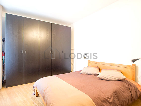 Bedroom with wooden floor