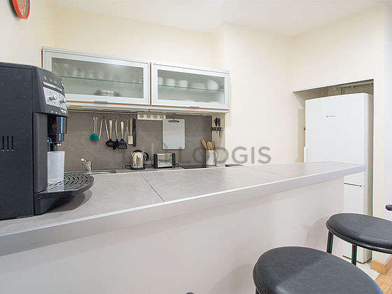 Kitchen where you can have dinner for 3 person(s) equipped with dishwasher, hob, refrigerator, stool
