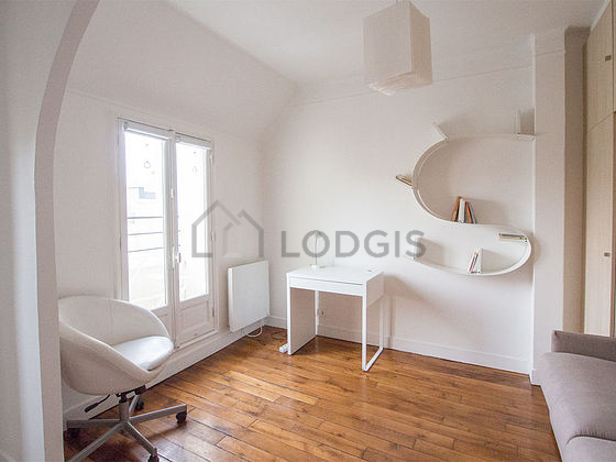 Very quiet living room furnished with 1 sofabed(s) of 160cm, desk, cupboard, 1 chair(s)