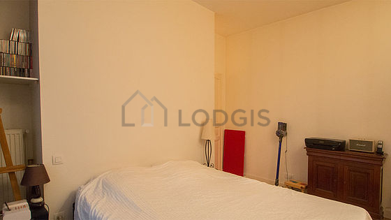 Bedroom with wooden floor