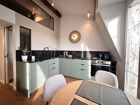 Magnifique cuisine avec du parquet au sol