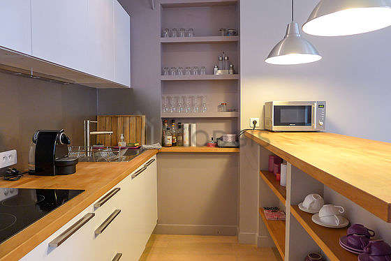 Kitchen where you can have dinner for 2 person(s) equipped with washing machine, refrigerator