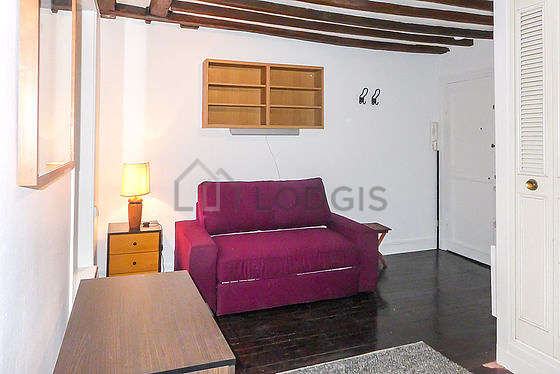 Quiet living room furnished with 1 sofabed(s) of 140cm, tv, storage space, cupboard