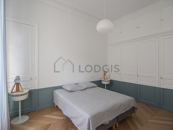Bedroom with wooden floor