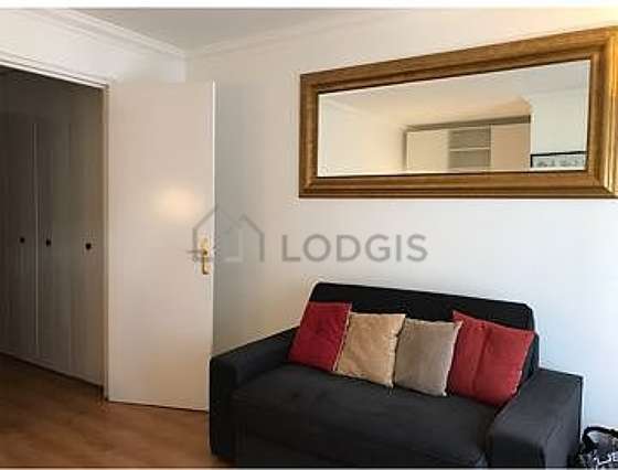 Very quiet living room furnished with 1 bed(s) of 140cm, 1 sofabed(s) of 140cm, tv, cupboard
